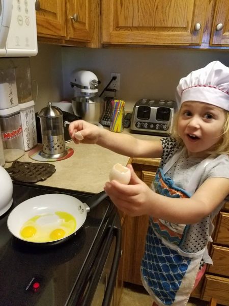 Addie Cooking Eggs