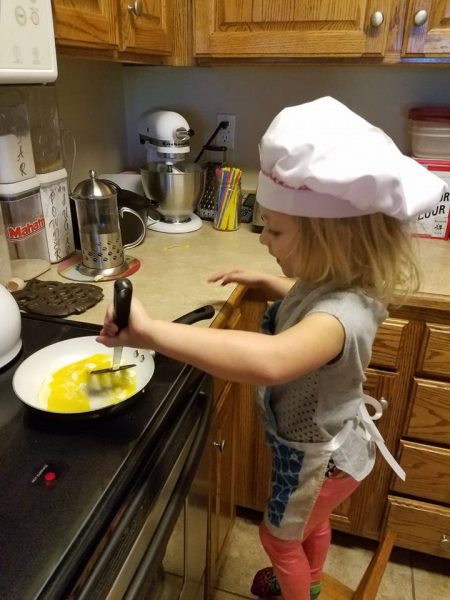 Addie Cooking Eggs